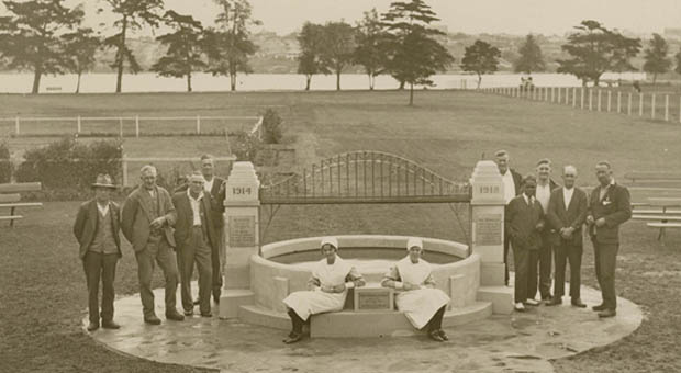 Douglas Grant, nurses and ex-servicemen gather around the war memorial built by Grant at Callan Park, which featured an ornamental pond and a replica of the Sydney Harbour Bridge, 1931 (Photograph courtesy State Library of NSW, Digital Order number a368022)